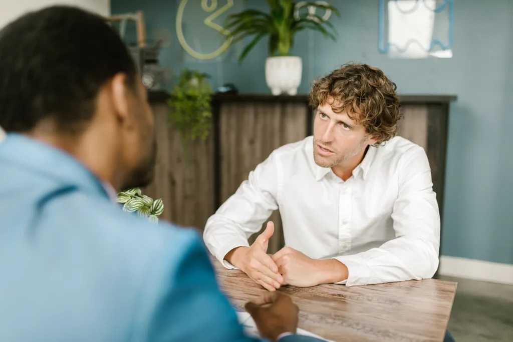 man in an awkward pricing discussions
