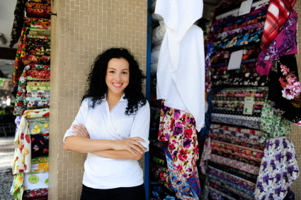 happy owner of a fabric store products to sell