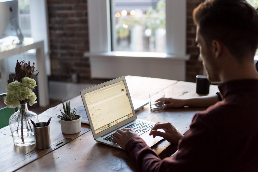 man on computer