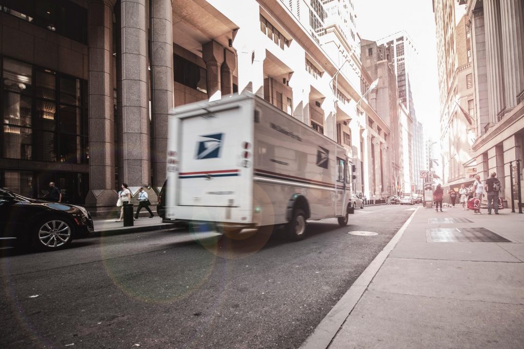delivery of goods USPS truck