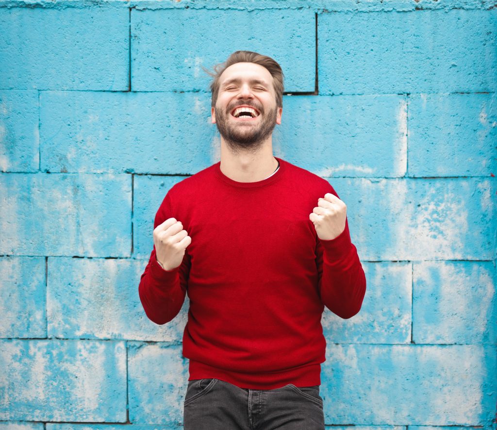A person happy because they succeeded in expanding your business reach by moving
