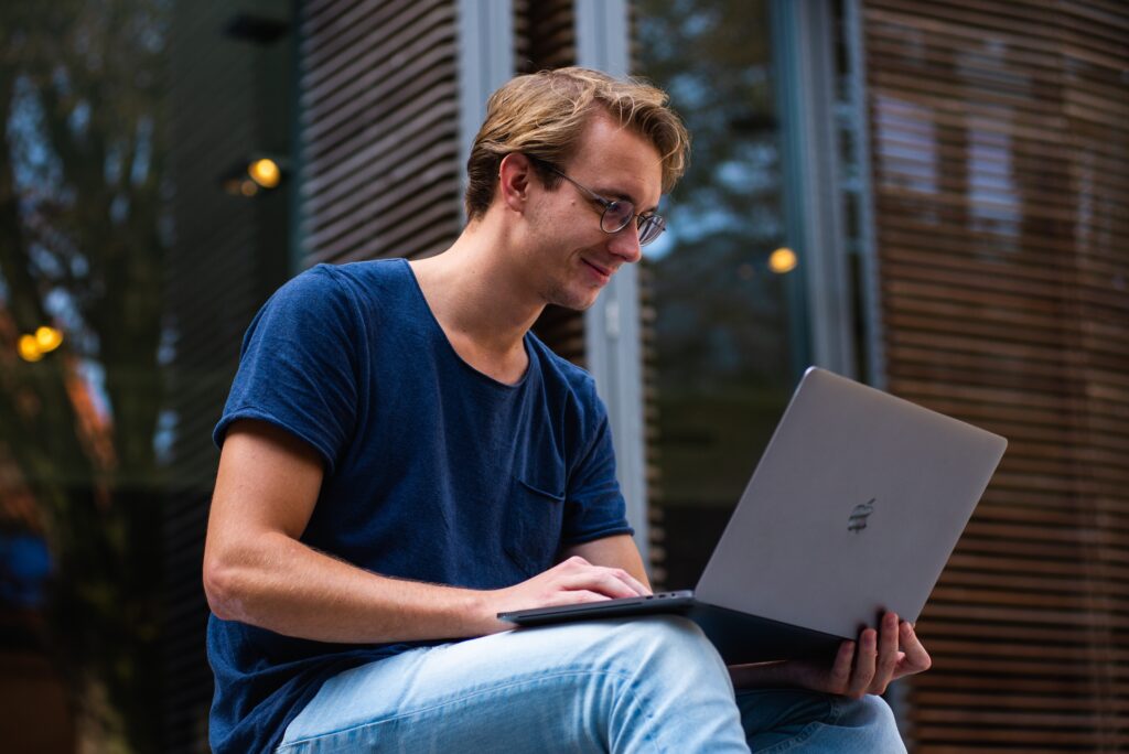 millennial on laptop