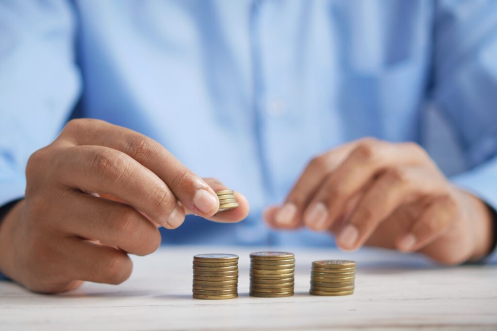 counting money operating on a shoestring budget