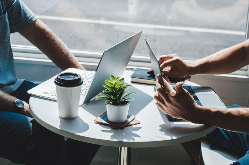 employees working outdoors with their work tech
