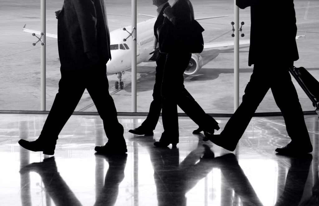 businessmen at the airport to travel: private air travel
