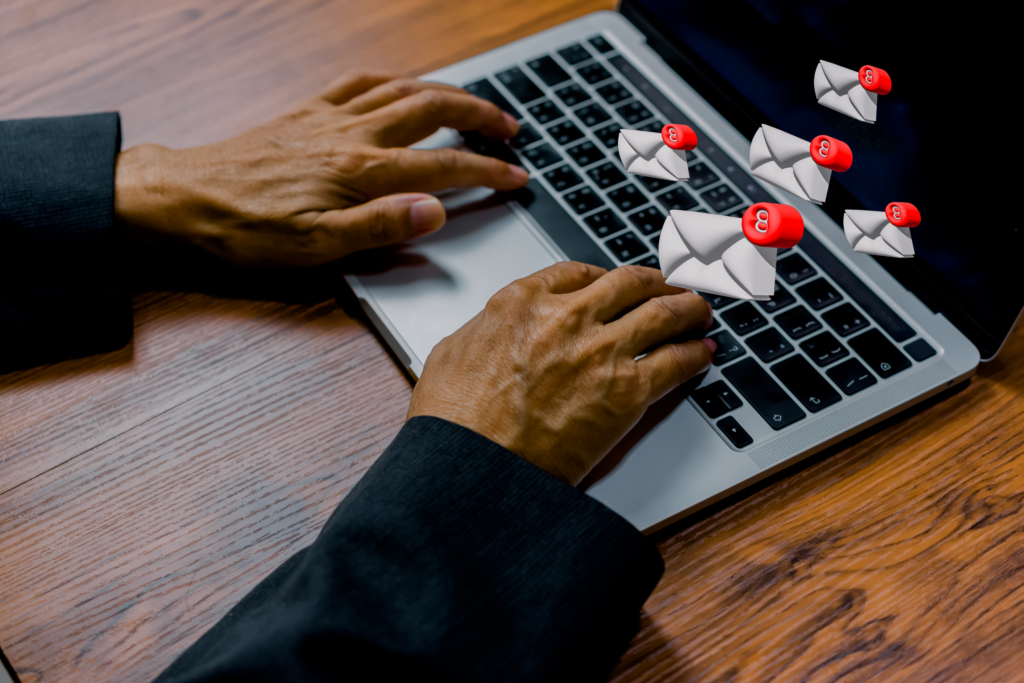 man sending emails as a way to promote your website