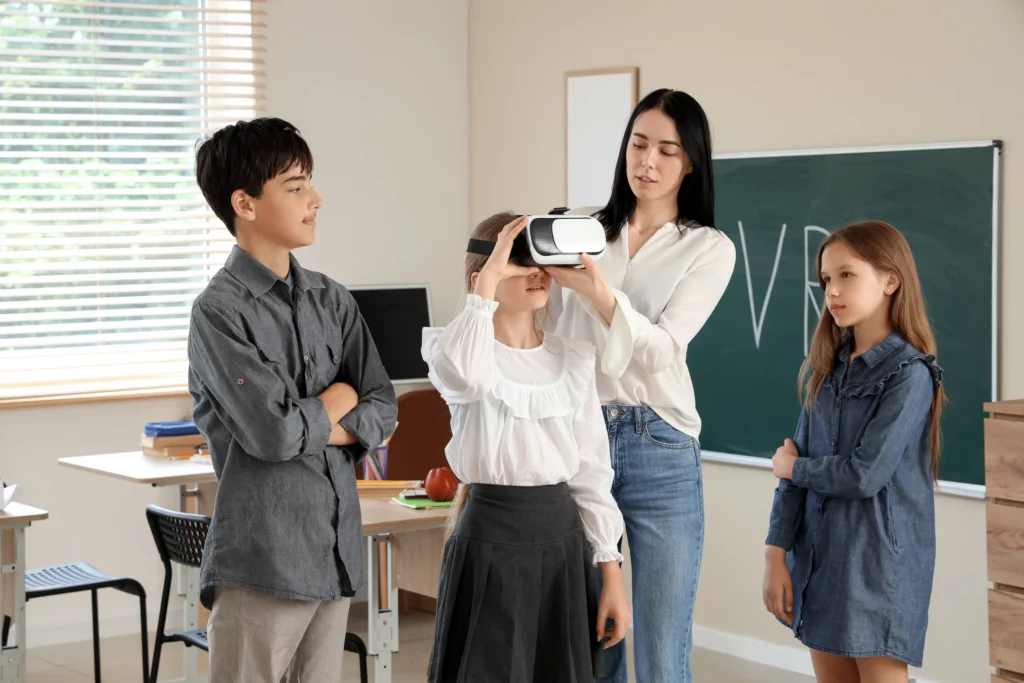 Special Education Service Providers: teacher letting children use virtual reality googles in classroom