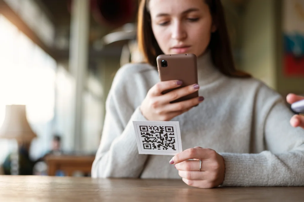 woman scanning QR codes