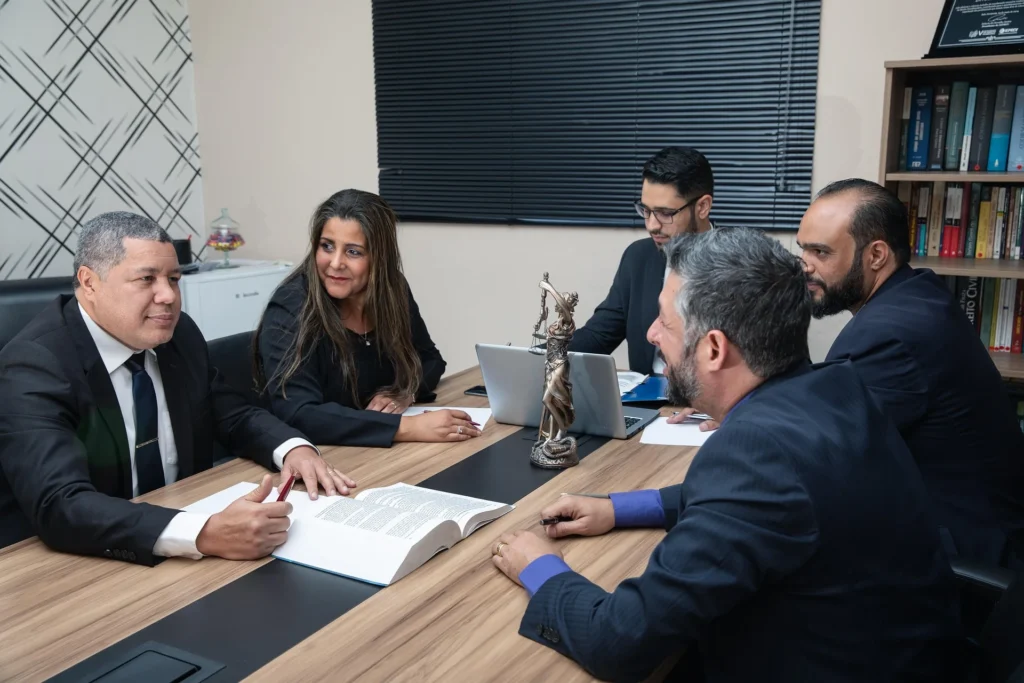lawyers in a meeting: start a law firm