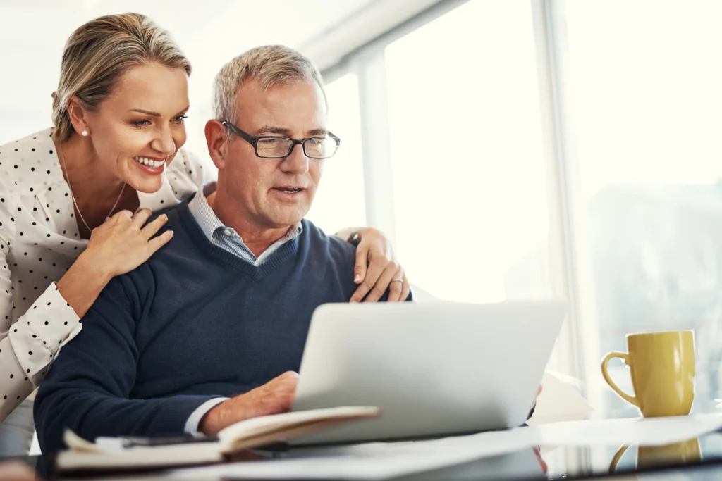 retired couple checking their personal pension