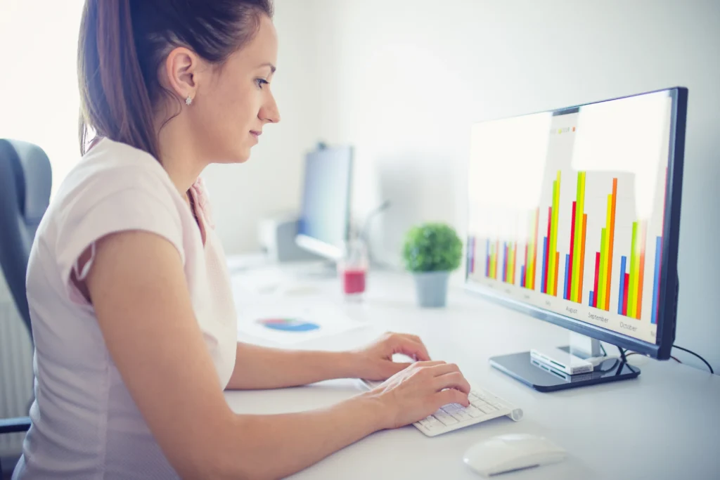 outsource data entry : woman typing in computer