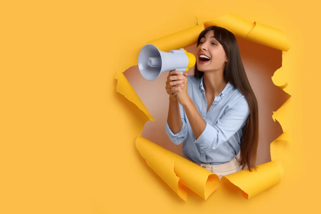 word-of-mouth marketing: lady with bull horn